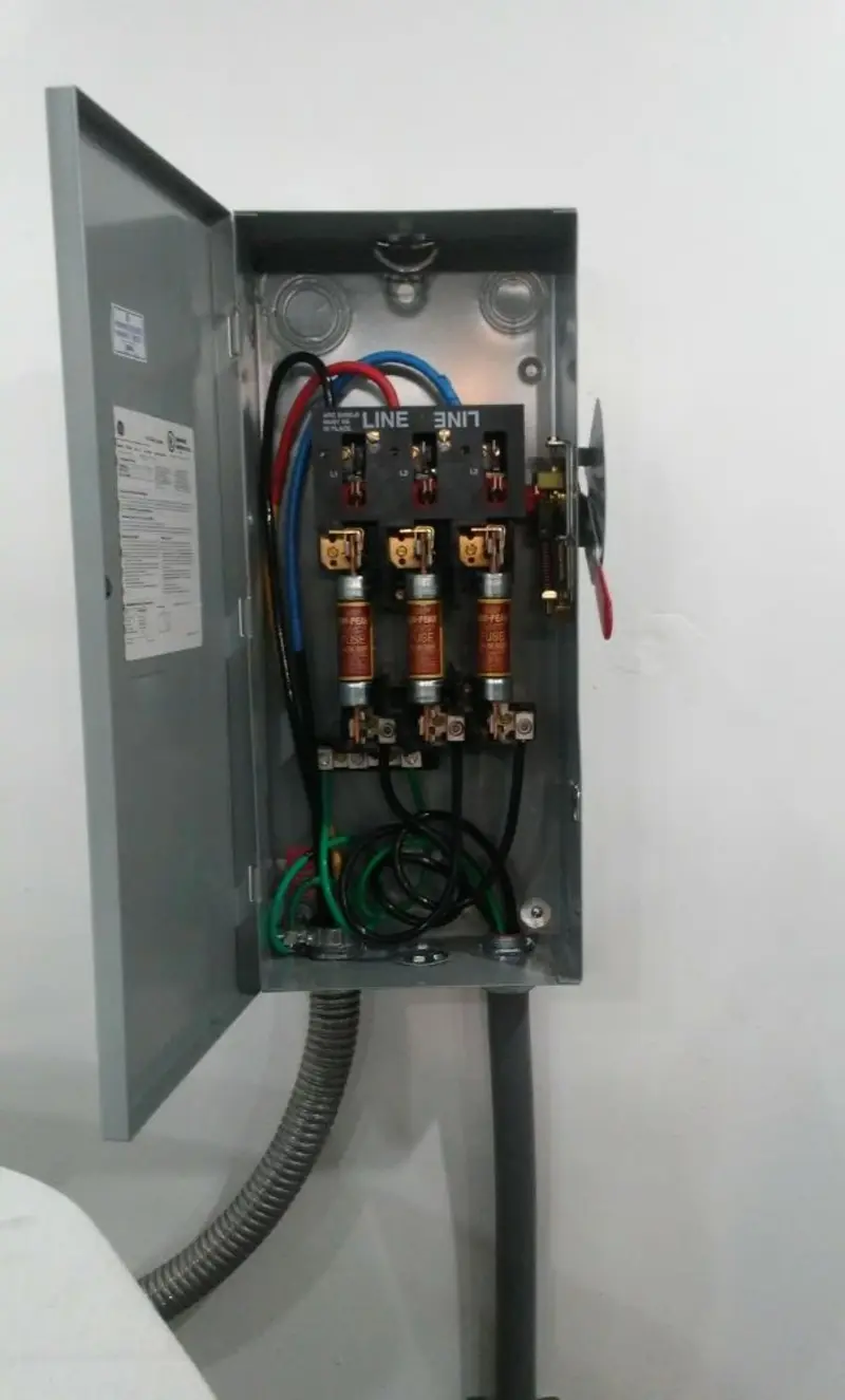 Three-phase disconnect switch installed for Smoke Detector Installation in Heathrow